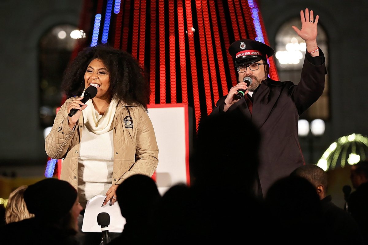 Alexis emceeing an outdoor holiday event